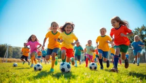 Children joyfully playing football in vibrant Kids Football Kits on a sunny field.